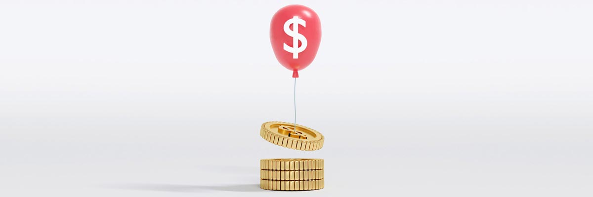 Coin being lifted into the air by a ballon marked with a dollar sign