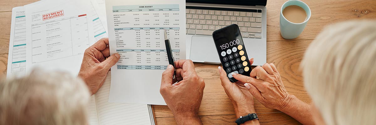 Elderly couple arguing about finances