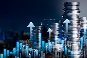 Photomontage - stacks of coins, bar charts and line graphs tracking up, arrows pointing upwards